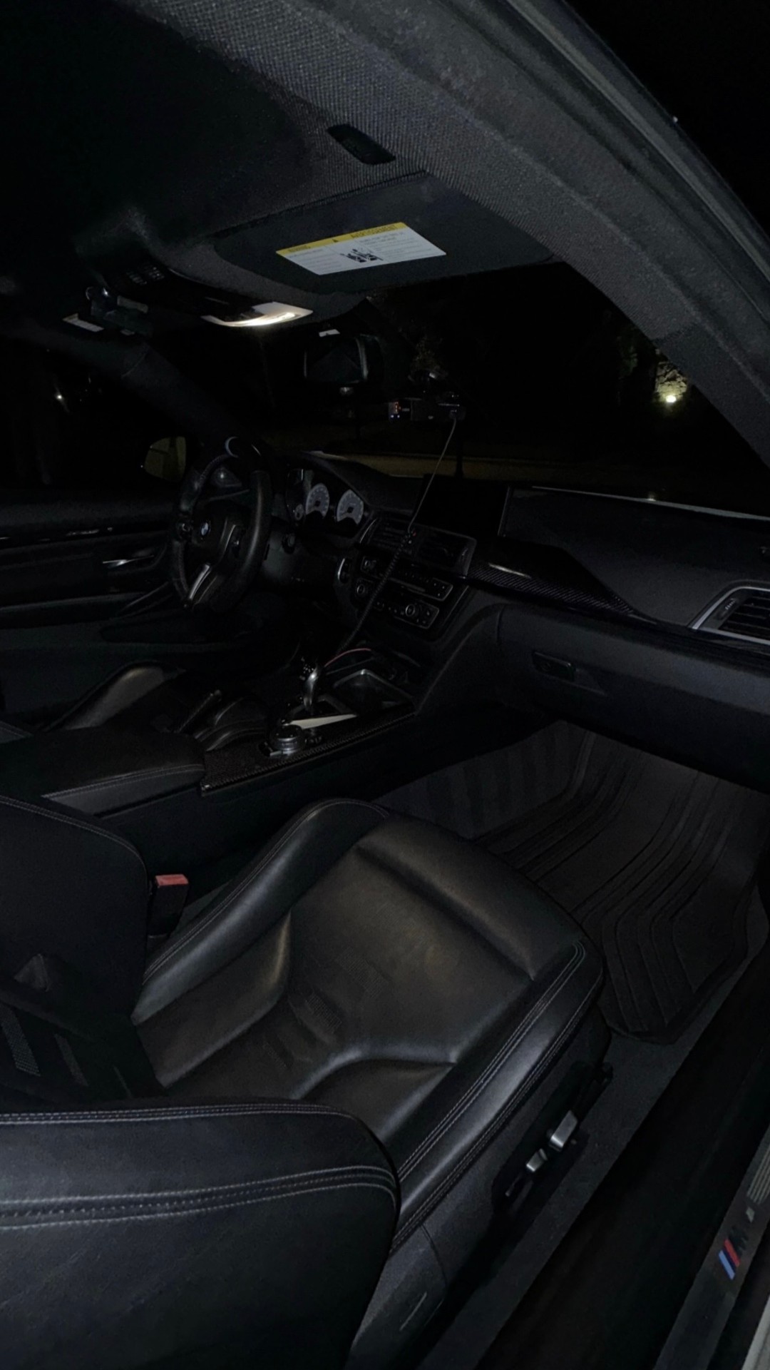 BMW M4 interior detail at night
